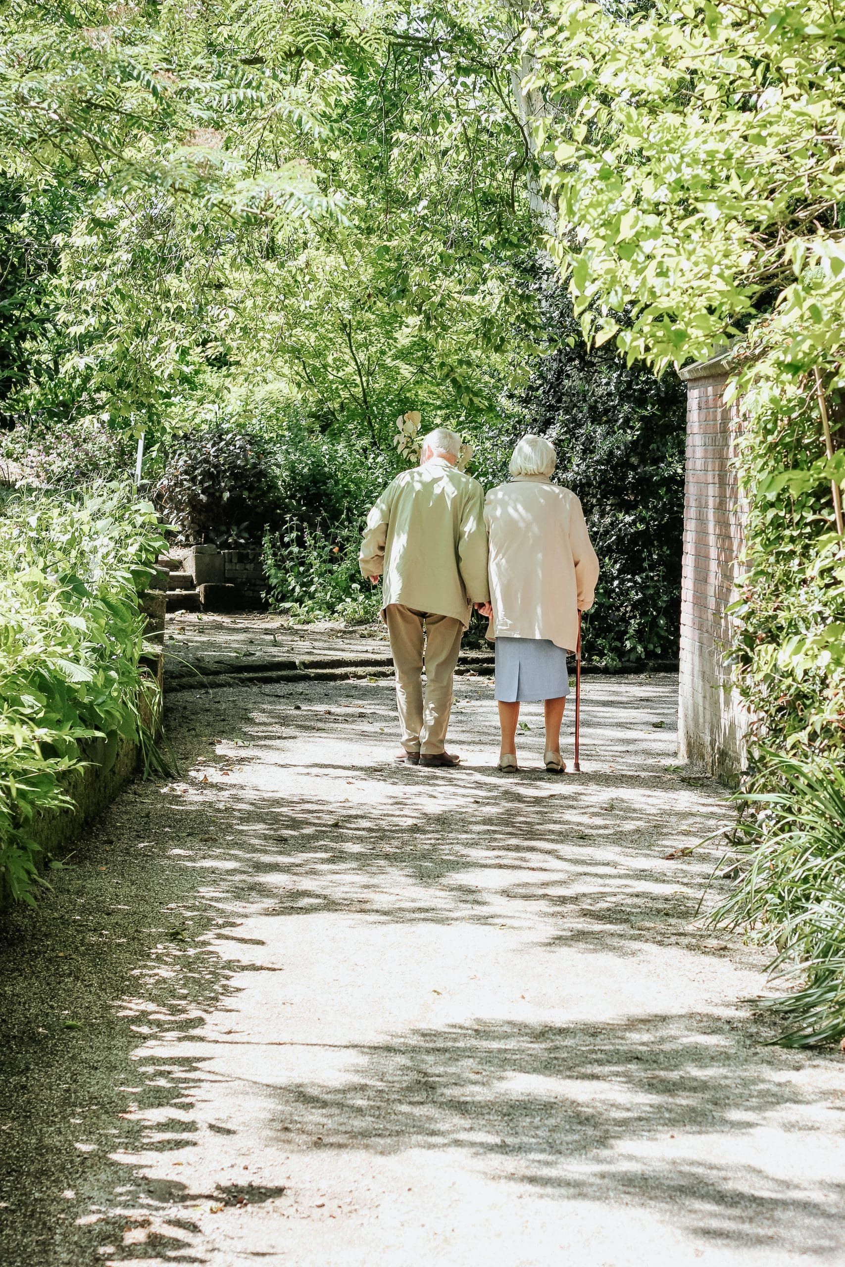 Older couple walking in the park