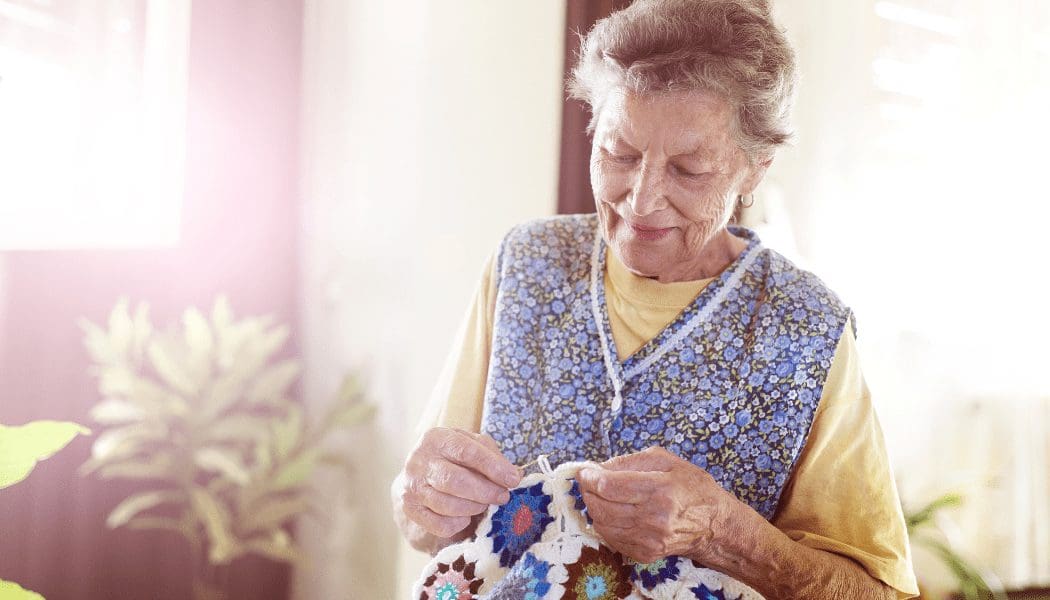 Senior lady knitting 